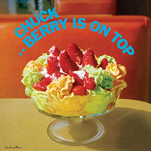 Album cover featuring a glass bowl of ice cream topped with strawberries.