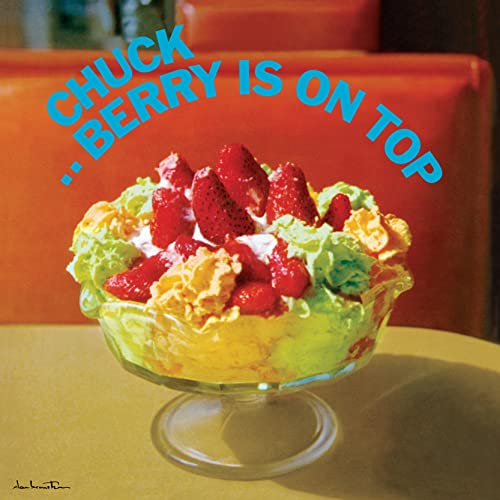 Album cover: Strawberries and ice cream on a yellow surface.