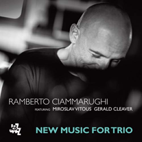 Black and white portrait of Ramberto Ciammarughi, album cover for jazz trio.