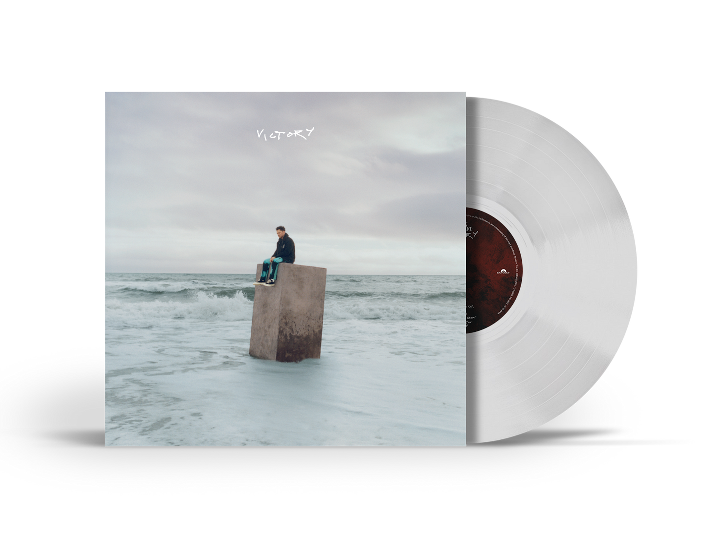 White vinyl record with cover art of a man on a concrete block.
