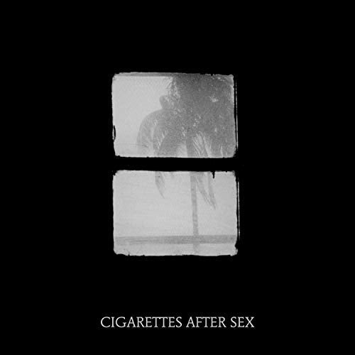 Black and white album cover showing a palm tree through two rectangular window panes.