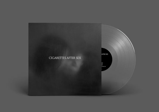 Cigarettes After Sex vinyl record album cover with a clear disc on gray background.