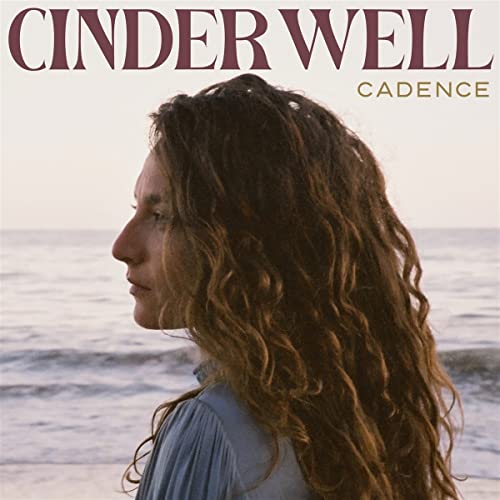 CD cover for Cinder Well’s “Cadence” featuring a woman with long hair.