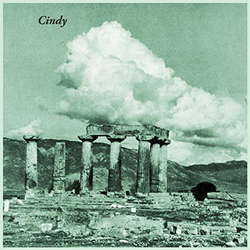 Vinyl record cover: ancient ruins against a cloudy, green sky.