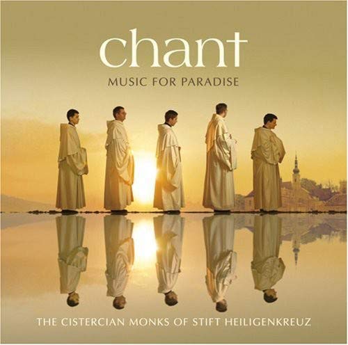 CD cover: monks in robes reflected in water, golden landscape.