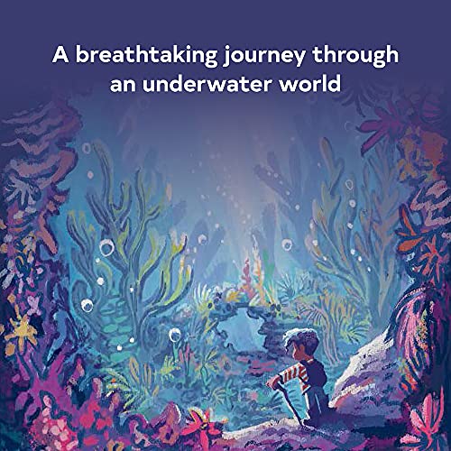 Boy looking at colorful underwater scene with coral and plants.