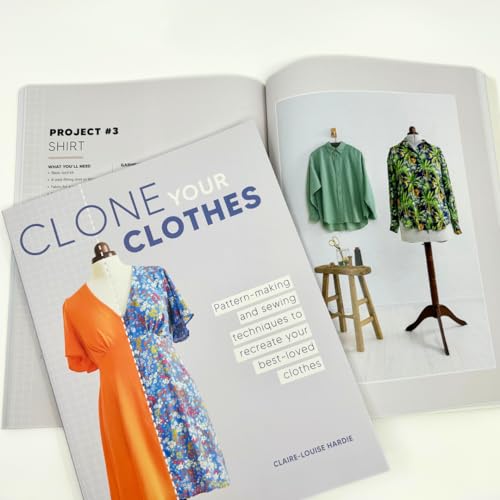 Open book showing sewing project instructions with photos of garments on dress forms.