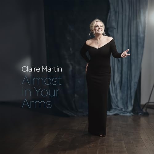 Claire Martin album cover: woman in black dress, blue backdrop.