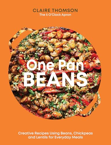 Cookbook cover featuring a colorful bean dish in a round pan.