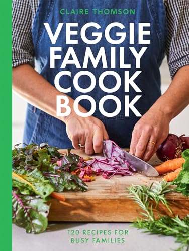 Cookbook cover featuring hands chopping vegetables on a wooden board.