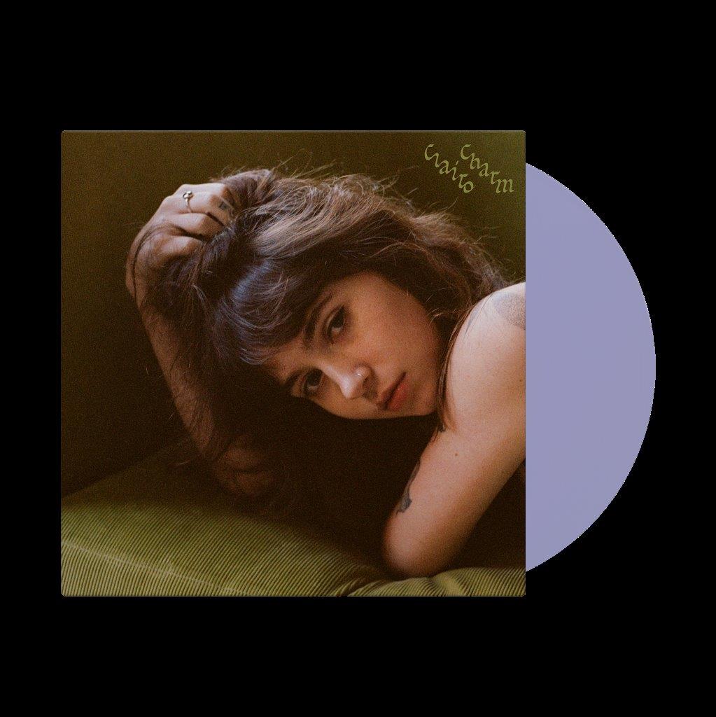 Clairo’s “Charm” vinyl record cover and a light purple vinyl disc.