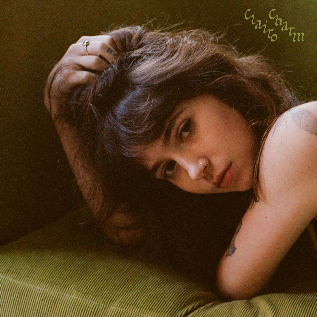 Clairo album cover, “Charm,” featuring a portrait of the artist.