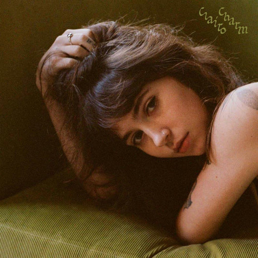 Clairo album cover, “Charm,” featuring a portrait of the artist.