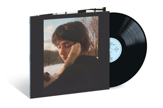 “Sling” vinyl record featuring Clairo with her arms around her head.