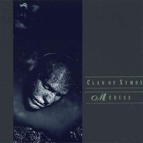 CD cover for Clan of Xymox’s “Medusa,” featuring a textured, dark portrait.