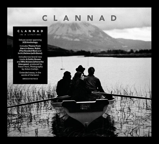 "Black and white album cover with men in a boat on a lake."
