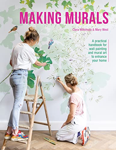 Book cover showing two women painting a large leafy mural on a wall.
