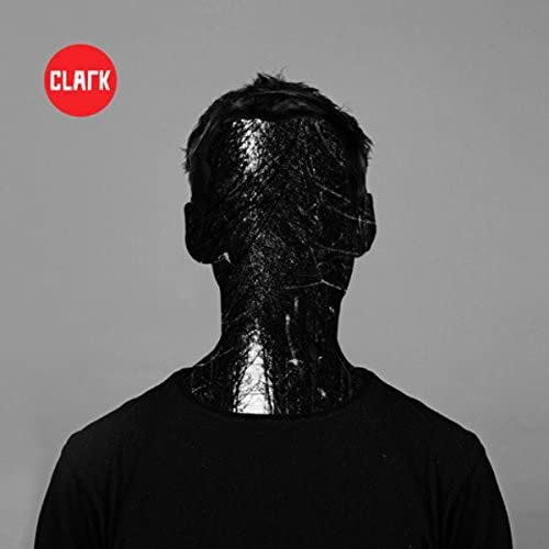 CD cover: Back of a man’s head obscured by black, textured lines.
