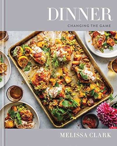 Cookbook cover featuring roasted chicken and vegetables on a baking sheet.