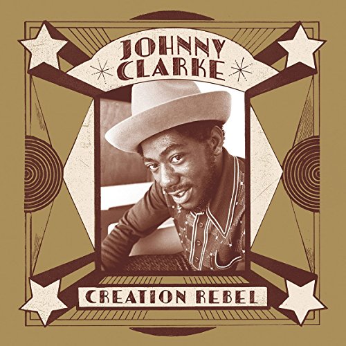 "Vinyl album cover with sepia-toned photo of Johnny Clarke wearing a cowboy hat."