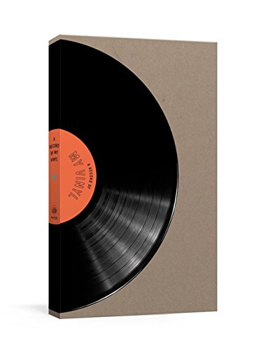 Record catalog book with a black vinyl record image on the cover.