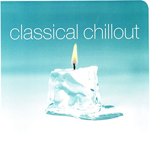A melting ice cube with a lit candle on a blue background.