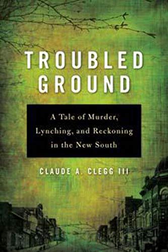 Book cover for "Troubled Ground" with green and black text, and a townscape.