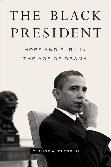 Book cover featuring a portrait of Barack Obama and a blurred sculpture.