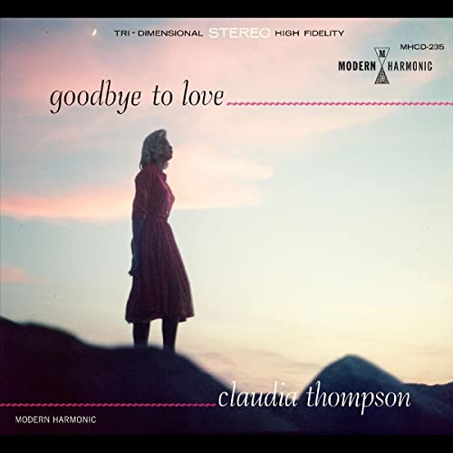 CD cover: woman in red dress facing a sunset landscape.