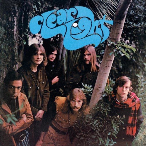 Album cover with six men standing in a forest, blue stylized text "Clear Light" above them.