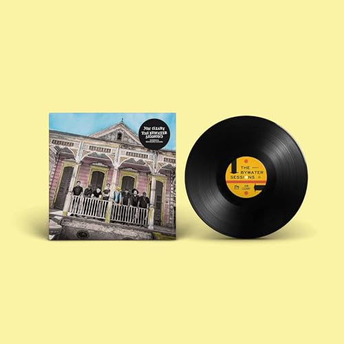 Vinyl record and album cover featuring a building and group of people.
