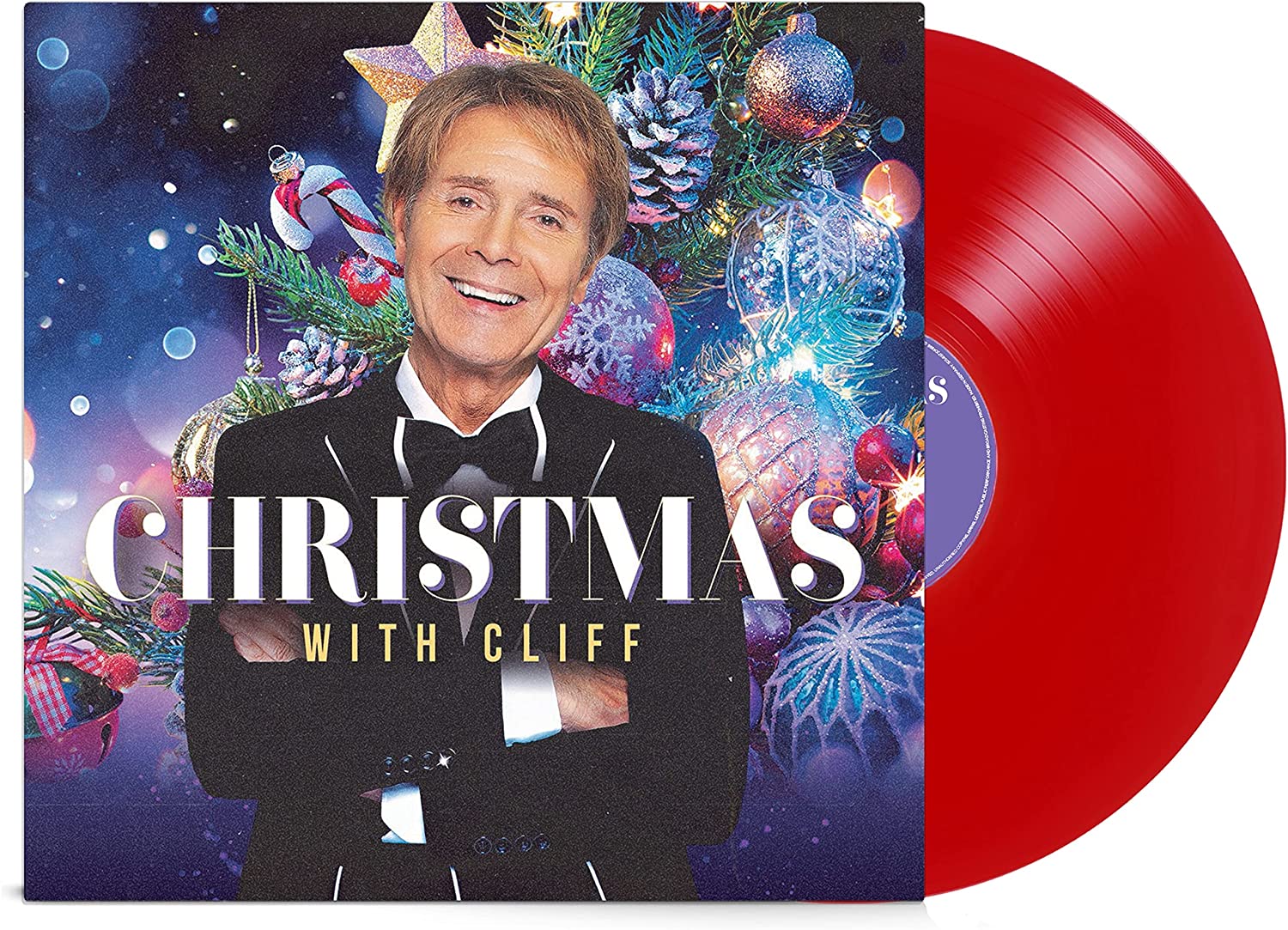 "Red vinyl record with cover featuring Cliff Richard surrounded by Christmas decorations."