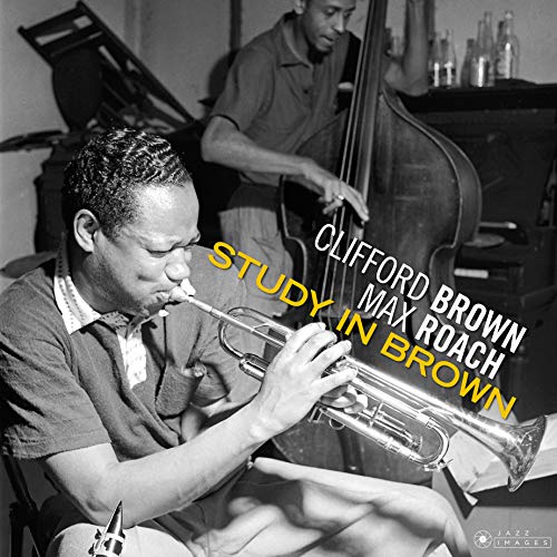 Black and white photo of Clifford Brown playing trumpet, album cover.