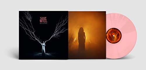 She Will" vinyl record with pink disc and dark, atmospheric cover art.