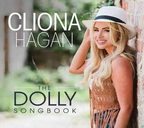 Cliona Hagan album cover: blonde woman in a white hat smiles outdoors.