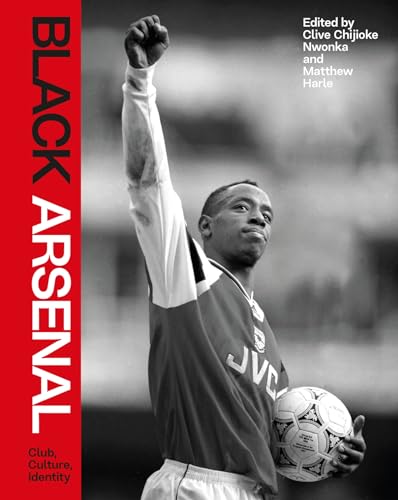 Black and white book cover featuring a footballer with a raised fist holding ball.
