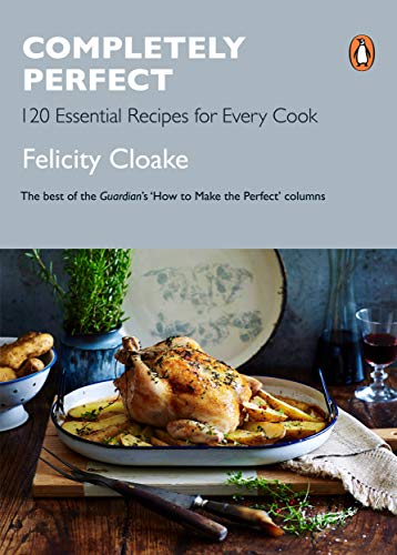 "Cookbook cover with roasted chicken on a plate, gray background, and white title text."