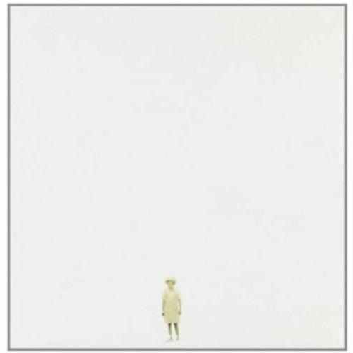 White album cover featuring a small figure of a woman in yellow.