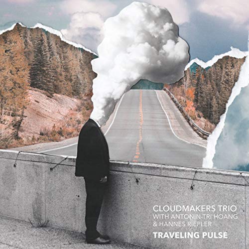 "Album cover with a man standing by a road, surrounded by torn landscape and a cloud."