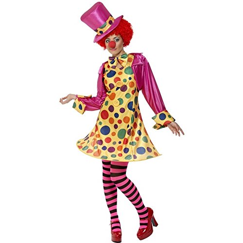 Woman in colorful clown costume with red curly wig and polka dot dress.