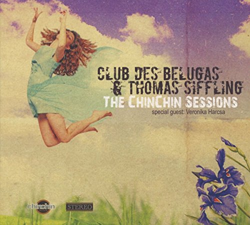 CD album cover with a woman jumping, surrounded by flowers and cloudy sky.