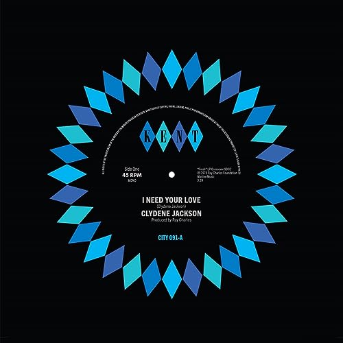Black vinyl record label with blue and teal diamond pattern border and white text.