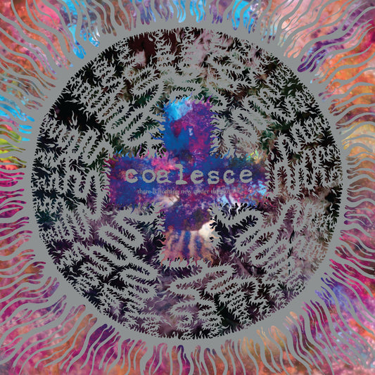 Abstract colorful background with a central grey sun-like emblem and band text overlay.