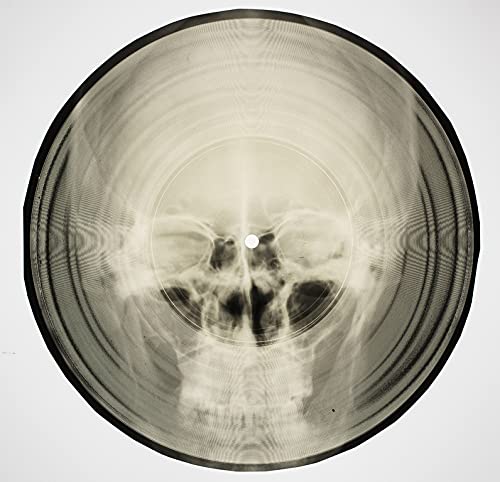 Vinyl record with a central X-ray image of a human skull.