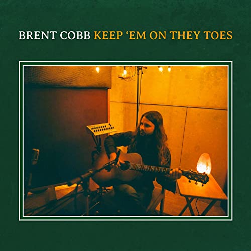 CD cover for Brent Cobb’s “Keep ‘Em On They Toes” featuring a musician.