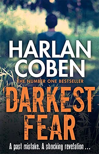 Book cover showing a silhouette of a person standing in a grassy field.