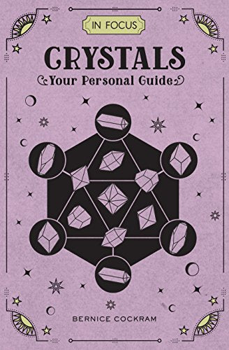 Purple book cover with black crystal illustrations and gold accents.