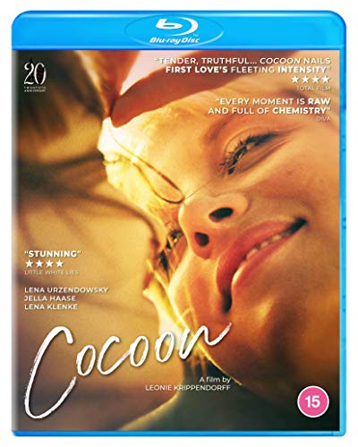 Blu-ray cover for the film Cocoon, featuring a close-up of two smiling faces.