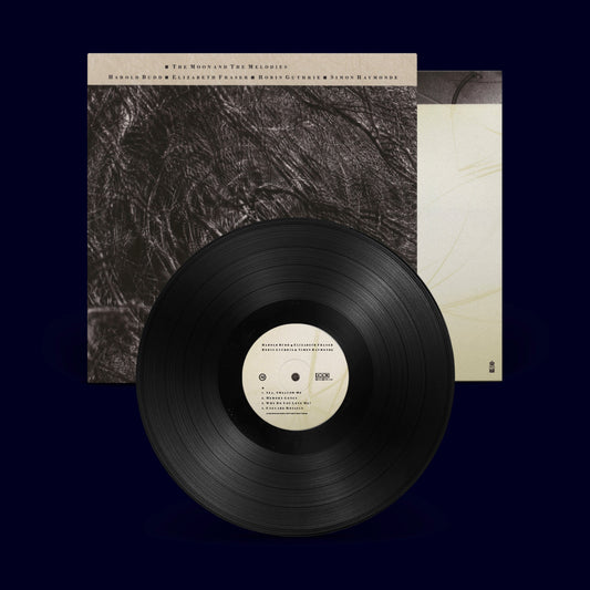 Vinyl record sleeve with artwork, text, and images related to Cocteau Twins and Harold Budd.