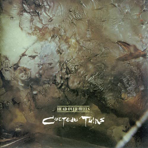 Cocteau Twins “Head Over Heels” CD cover: abstract, textured, and muted tones.